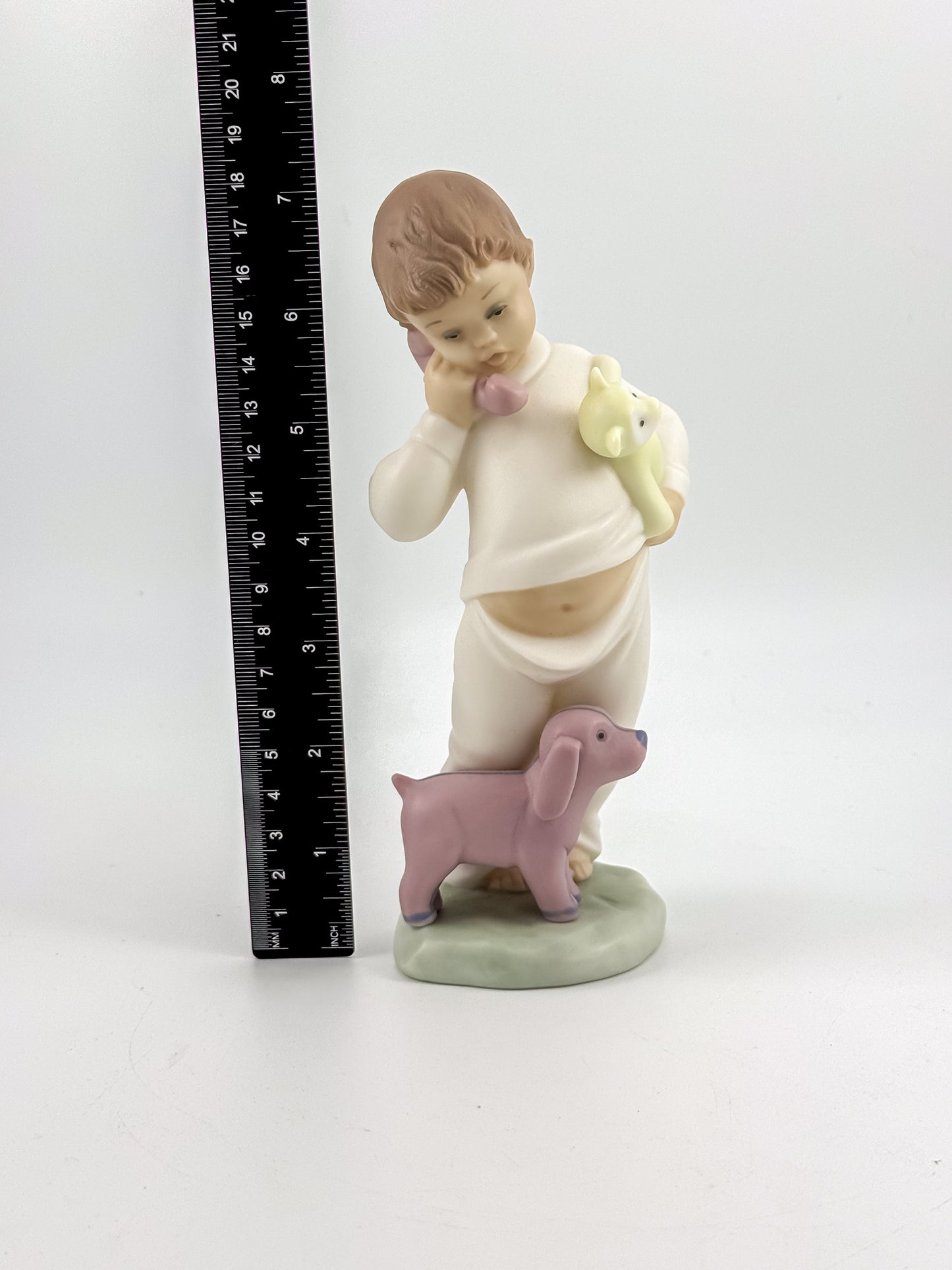 Lladró Nao "Someone Is Calling You" Porcelain Figurine, Boy on Phone with Dog and Bunny, Model #1044