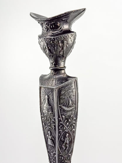 Antique Dutch Storyteller Candlestick with Figural Relief Panels and Fine Dutch Finish, Early 1900s