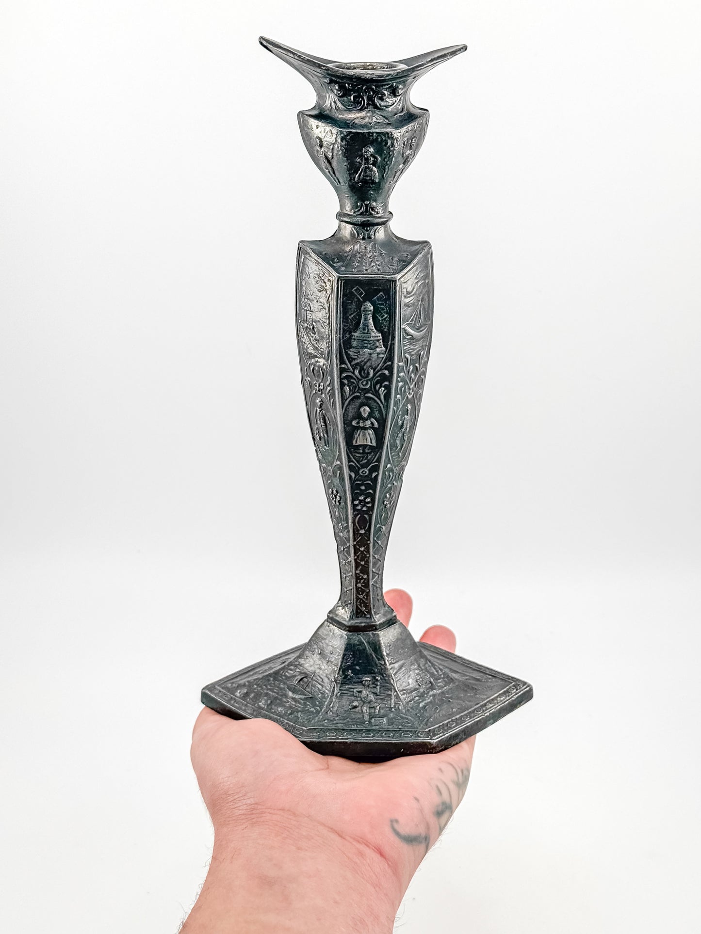 Antique Dutch Storyteller Candlestick with Figural Relief Panels and Fine Dutch Finish, Early 1900s