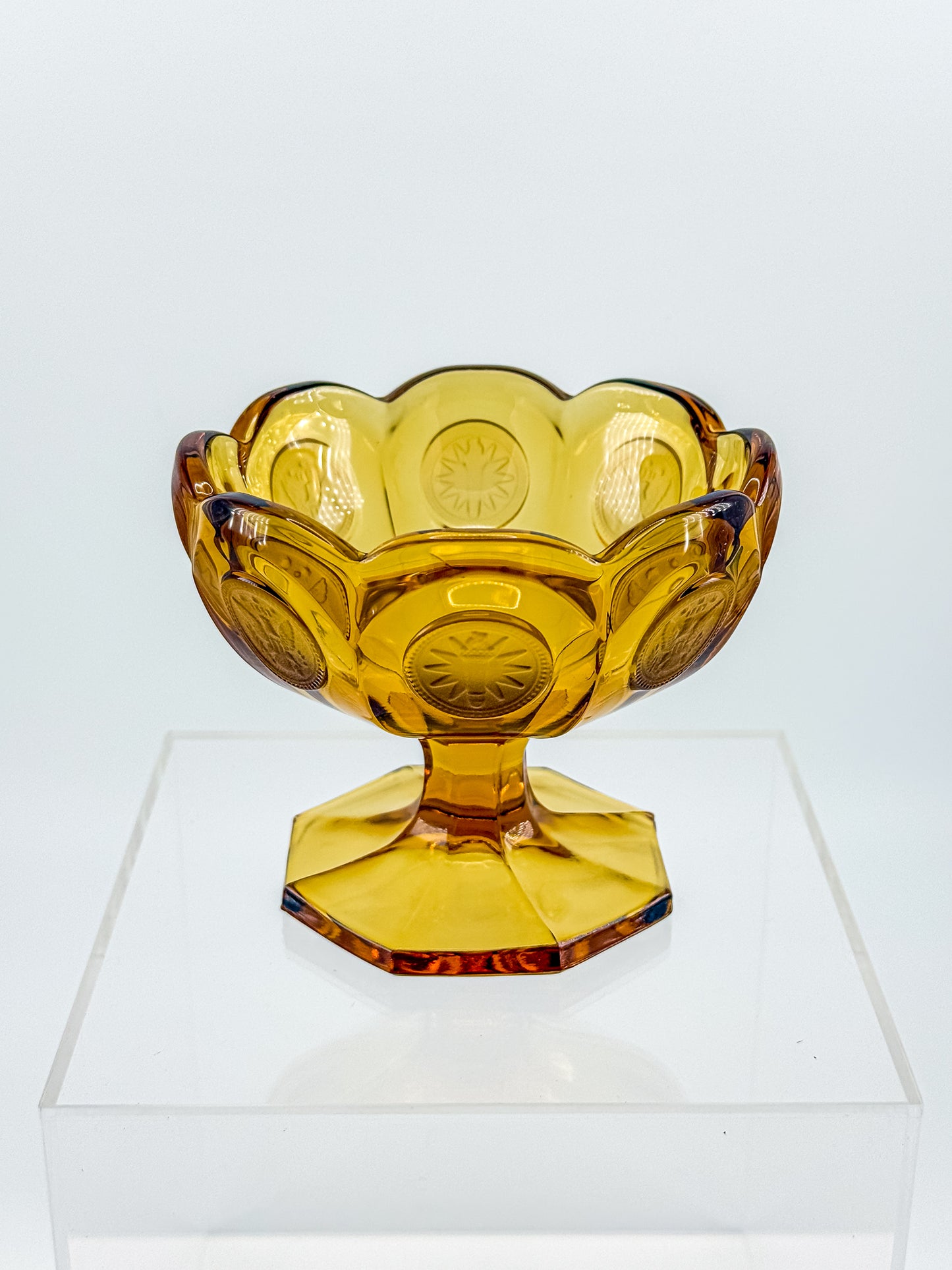 Fostoria Coin Glass Amber Pedestal Compote Candy Dish with Eagle Coin Motifs and Scalloped Rim