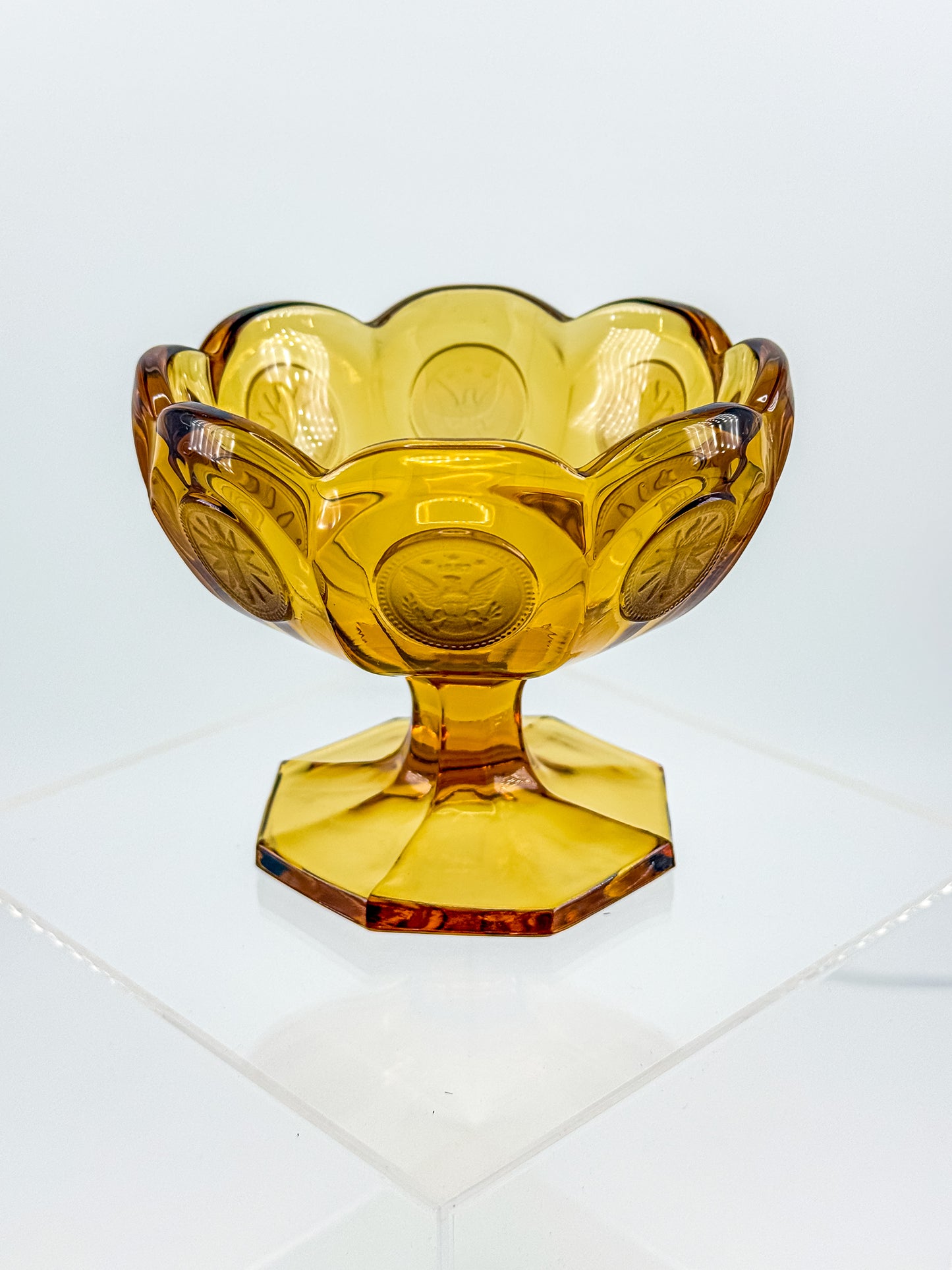 Fostoria Coin Glass Amber Pedestal Compote Candy Dish with Eagle Coin Motifs and Scalloped Rim