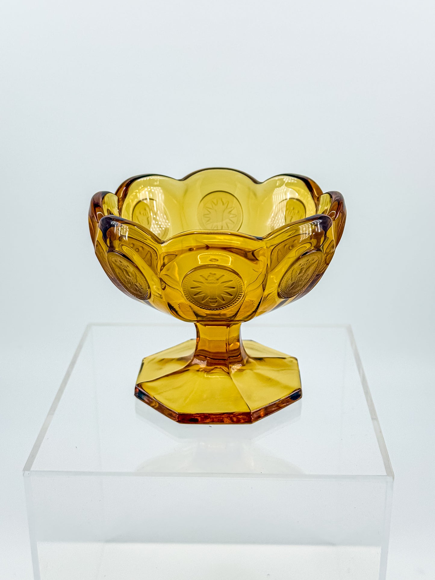 Fostoria Coin Glass Amber Pedestal Compote Candy Dish with Eagle Coin Motifs and Scalloped Rim