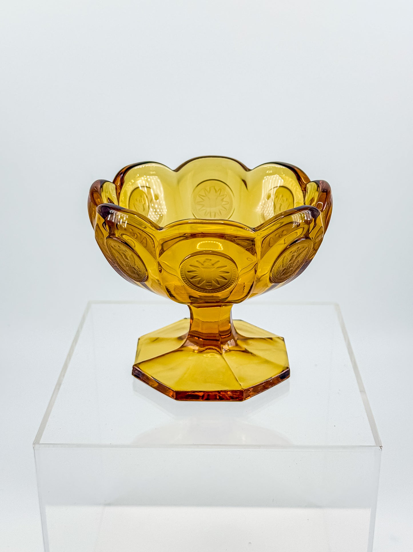 Fostoria Coin Glass Amber Pedestal Compote Candy Dish with Eagle Coin Motifs and Scalloped Rim