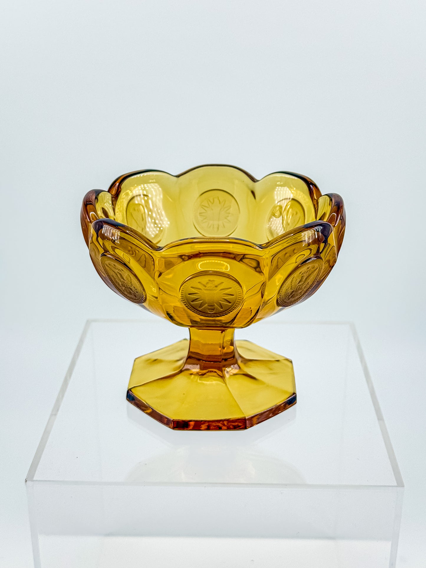 Fostoria Coin Glass Amber Pedestal Compote Candy Dish with Eagle Coin Motifs and Scalloped Rim