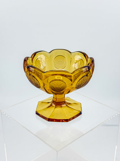 Fostoria Coin Glass Amber Pedestal Compote Candy Dish with Eagle Coin Motifs and Scalloped Rim