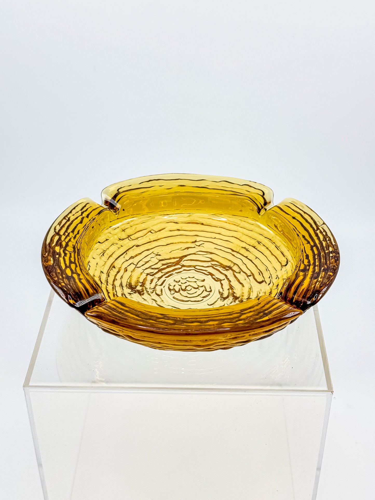 Vintage Anchor Hocking Soreno Amber Glass Ashtray with Concentric Bark Texture and Four Cigarette Rests