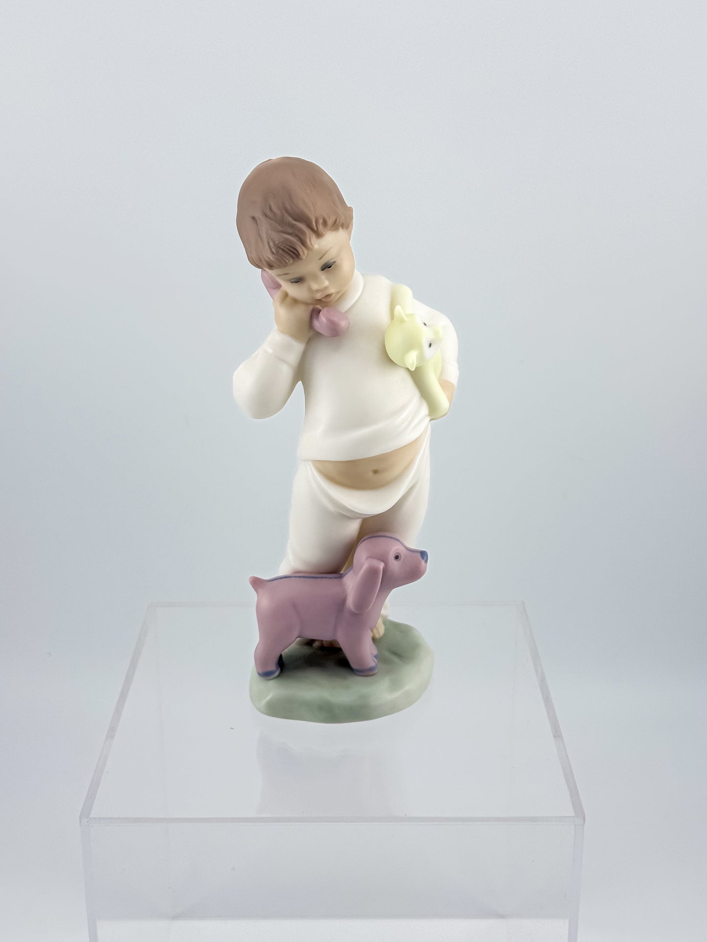 Lladró Nao "Someone Is Calling You" Porcelain Figurine, Boy on Phone with Dog and Bunny, Model #1044