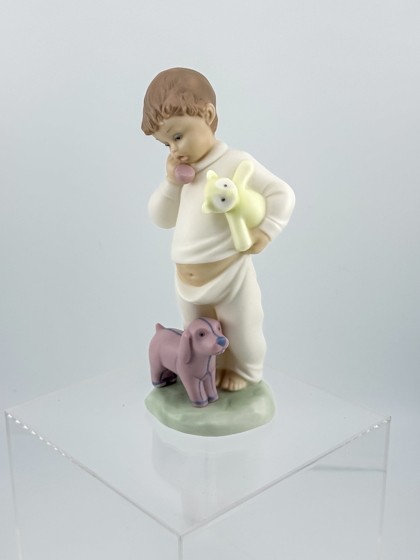 Lladró Nao "Someone Is Calling You" Porcelain Figurine, Boy on Phone with Dog and Bunny, Model #1044