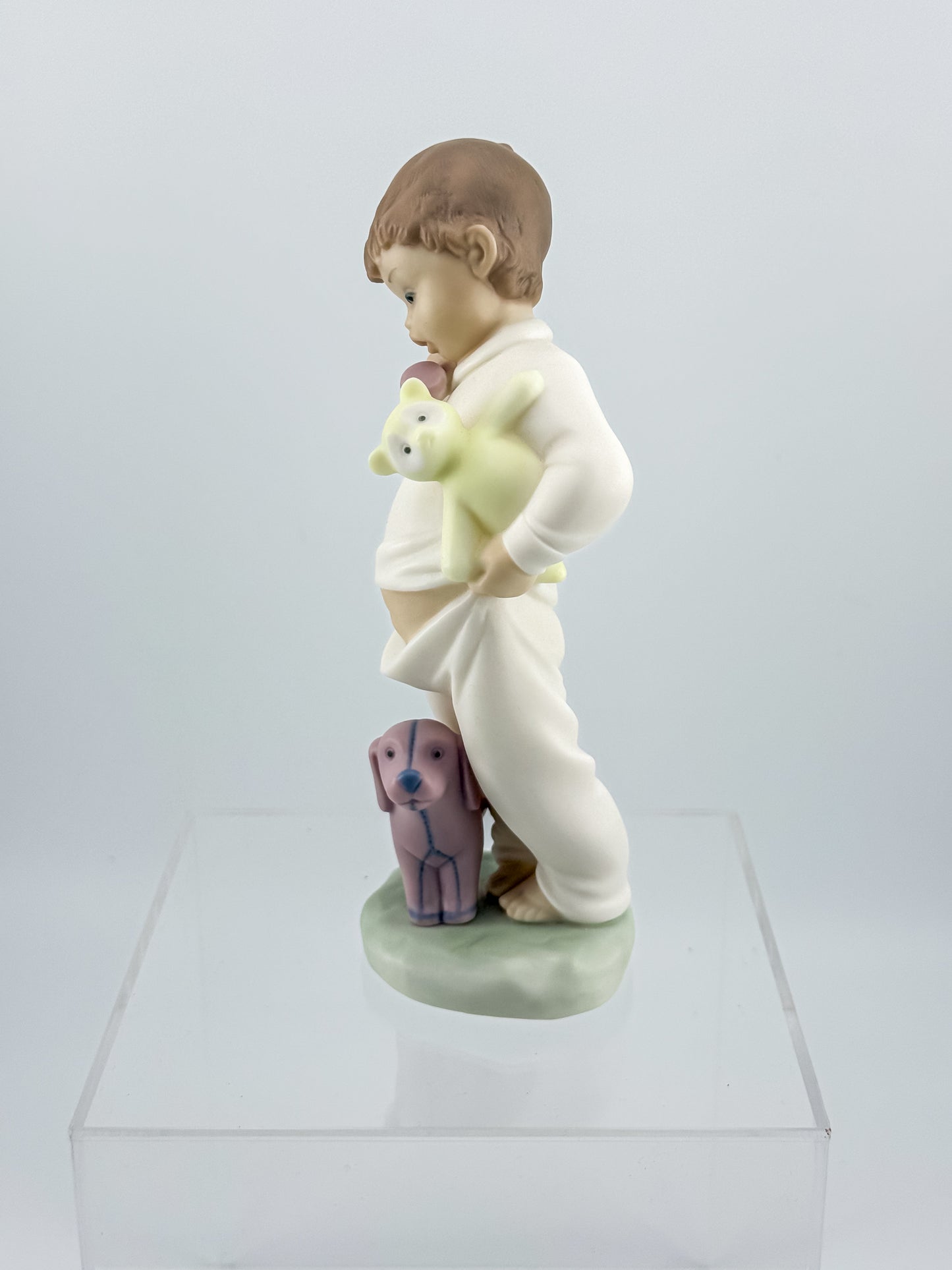 Lladró Nao "Someone Is Calling You" Porcelain Figurine, Boy on Phone with Dog and Bunny, Model #1044