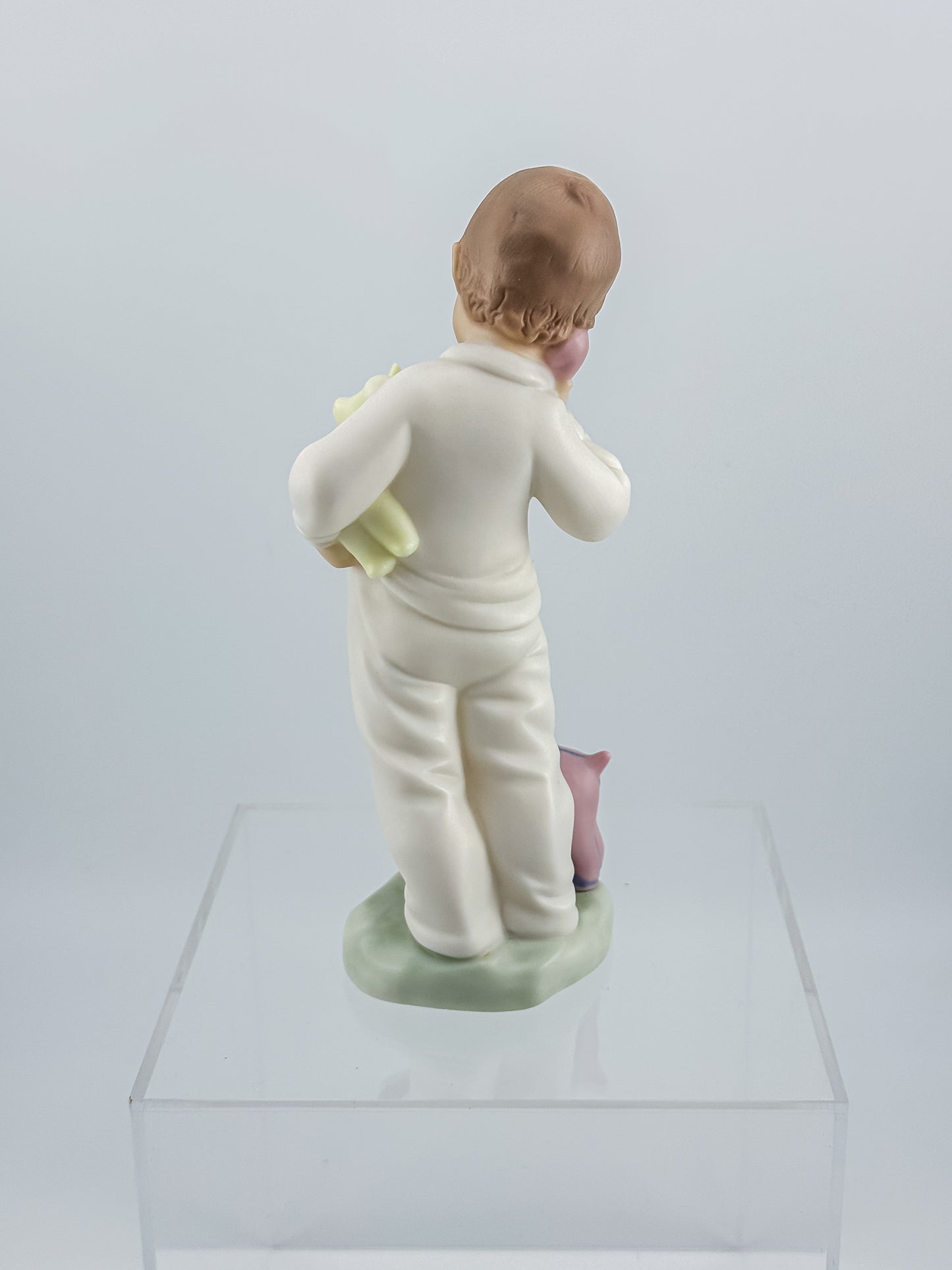 Lladró Nao "Someone Is Calling You" Porcelain Figurine, Boy on Phone with Dog and Bunny, Model #1044