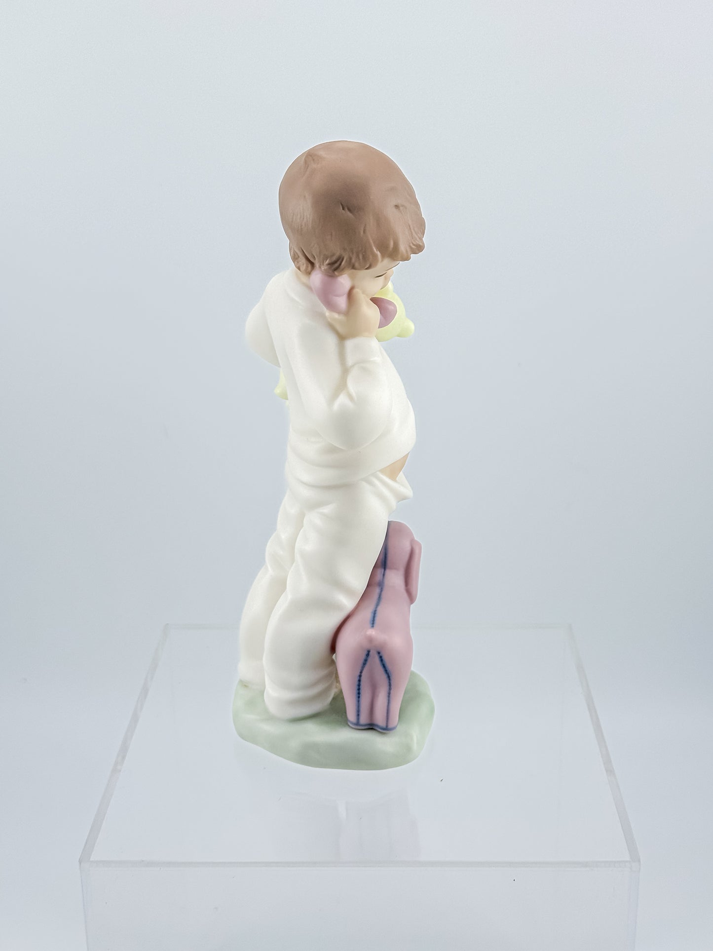 Lladró Nao "Someone Is Calling You" Porcelain Figurine, Boy on Phone with Dog and Bunny, Model #1044