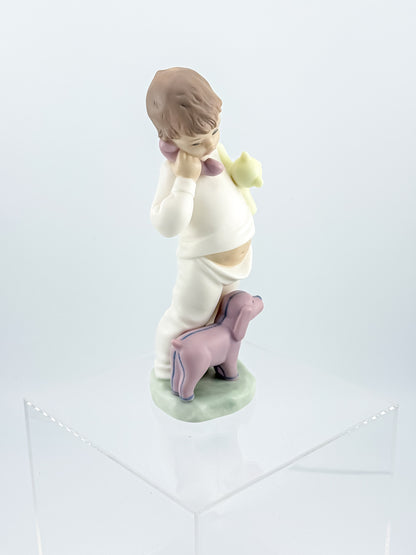 Lladró Nao "Someone Is Calling You" Porcelain Figurine, Boy on Phone with Dog and Bunny, Model #1044