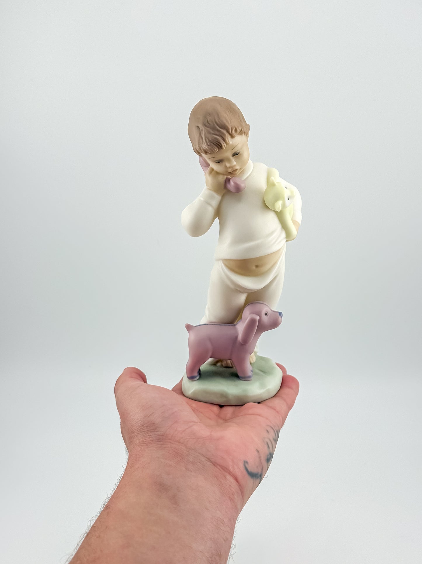 Lladró Nao "Someone Is Calling You" Porcelain Figurine, Boy on Phone with Dog and Bunny, Model #1044