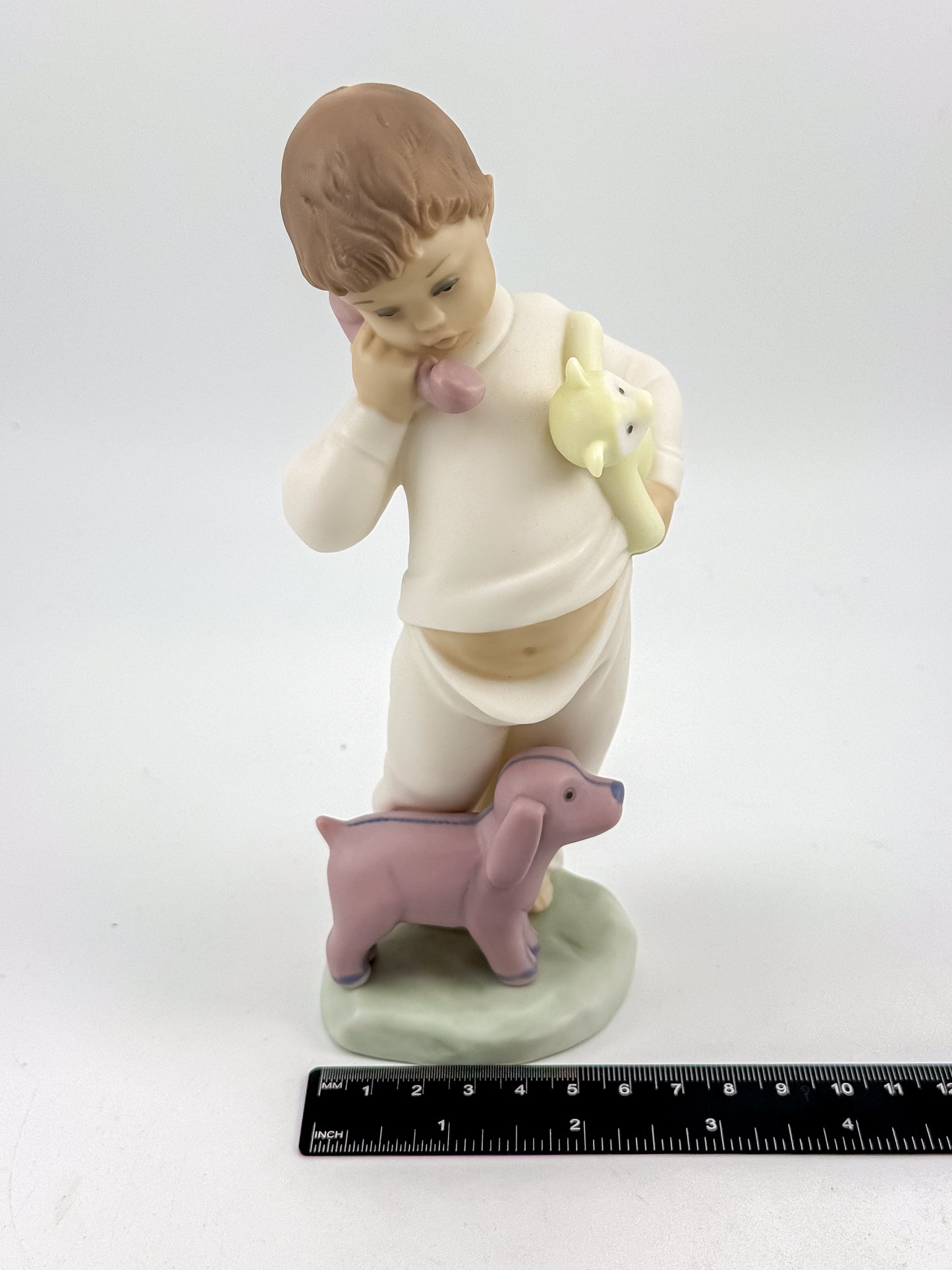 Lladró Nao "Someone Is Calling You" Porcelain Figurine, Boy on Phone with Dog and Bunny, Model #1044
