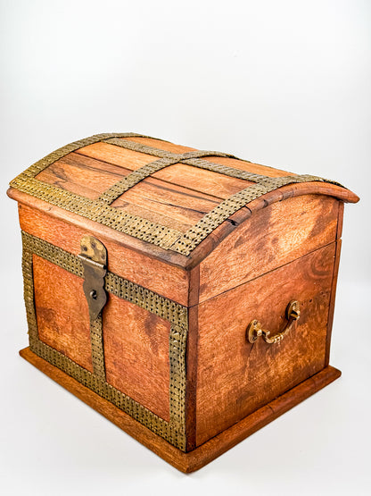 Front view of vintage Indian brass-inlay dome-top wooden treasure chest with ruler showing approx. 10 inch width