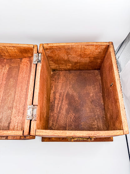 Back view of vintage Indian brass-inlay dome-top wooden treasure chest with ruler showing approx. 8 inch depth