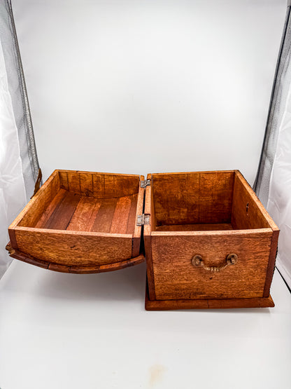 Three-quarter view of vintage Indian brass-inlay dome-top wooden chest showing brass banding detail