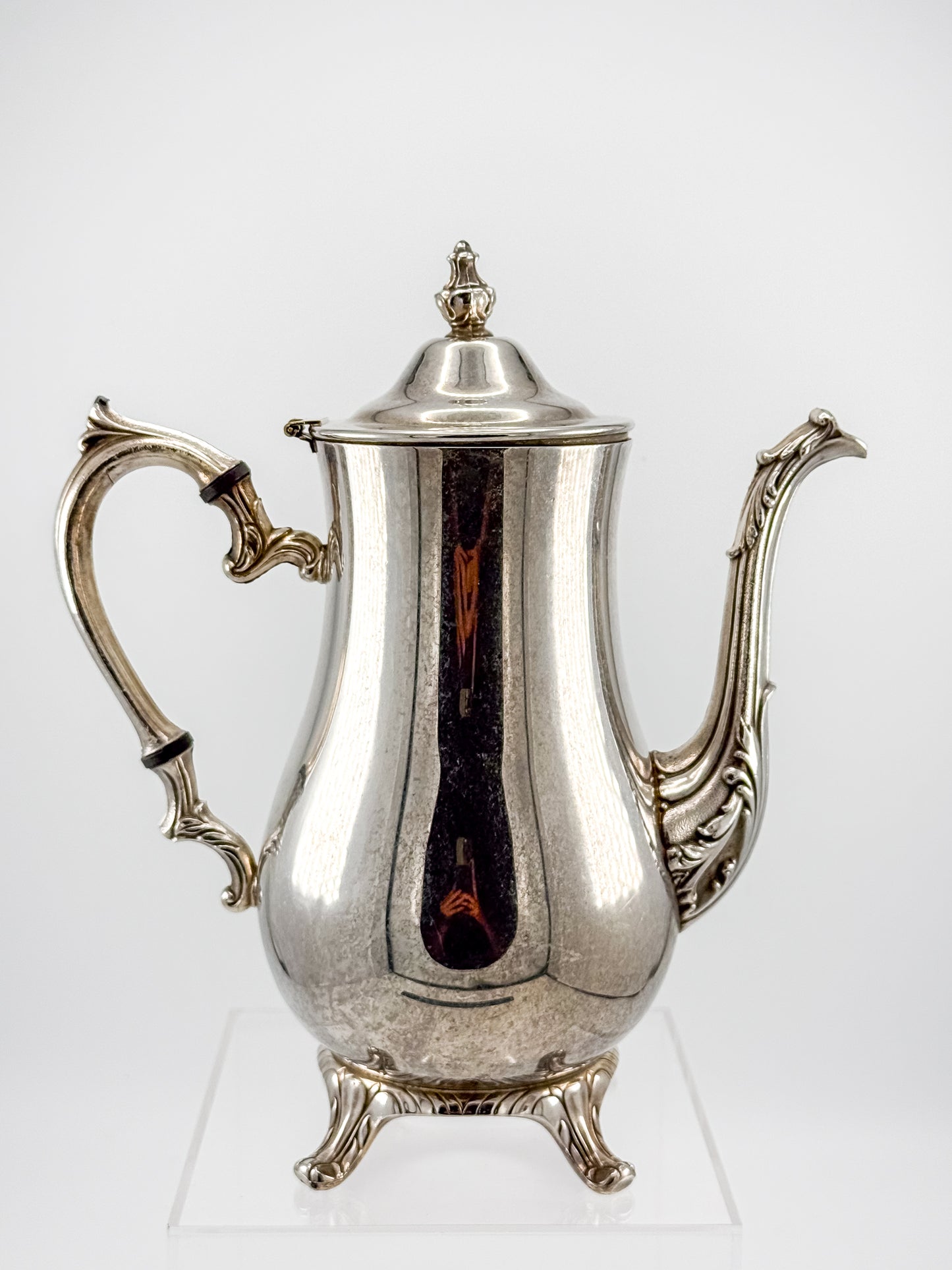 Vintage International Silver Co. Ornate Silver-Plate Teapot with Hinged Lid and Scroll Feet