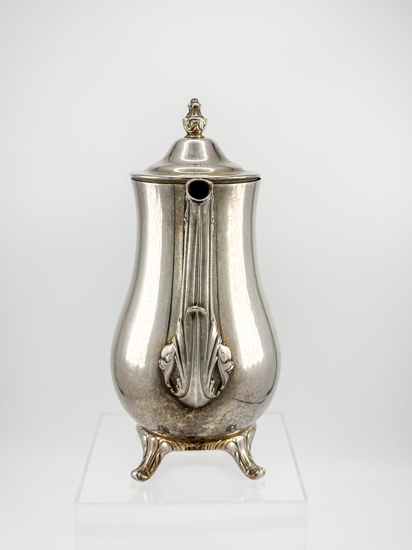 Vintage International Silver Co. Ornate Silver-Plate Teapot with Hinged Lid and Scroll Feet