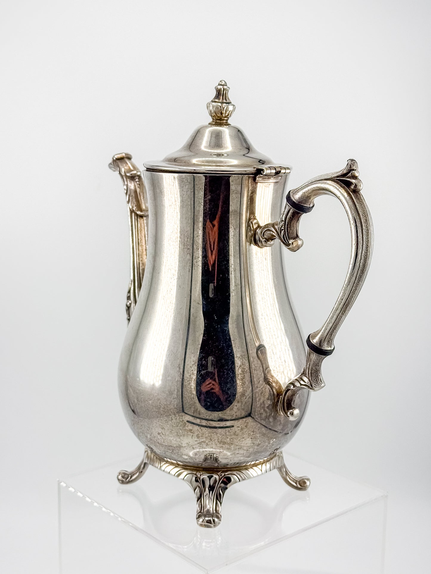 Vintage International Silver Co. Ornate Silver-Plate Teapot with Hinged Lid and Scroll Feet
