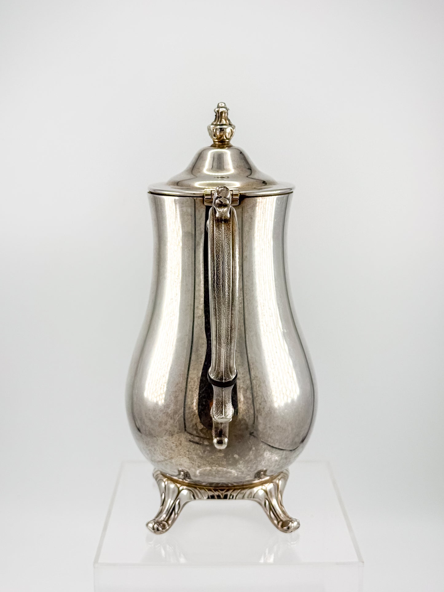 Vintage International Silver Co. Ornate Silver-Plate Teapot with Hinged Lid and Scroll Feet