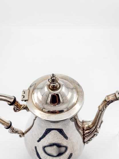 Vintage International Silver Co. Ornate Silver-Plate Teapot with Hinged Lid and Scroll Feet