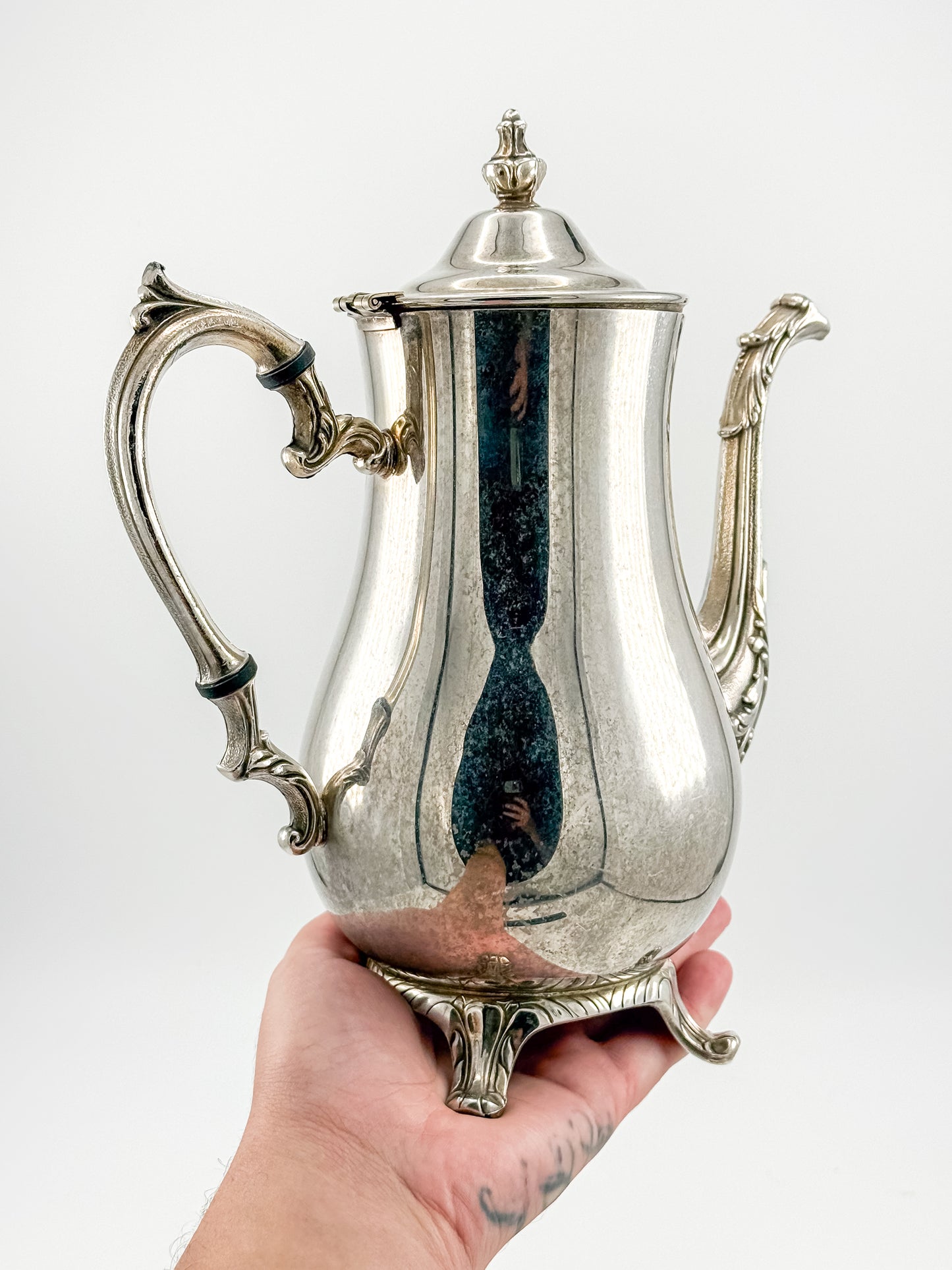 Vintage International Silver Co. Ornate Silver-Plate Teapot with Hinged Lid and Scroll Feet
