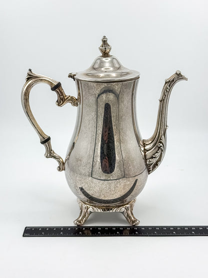 Vintage International Silver Co. Ornate Silver-Plate Teapot with Hinged Lid and Scroll Feet