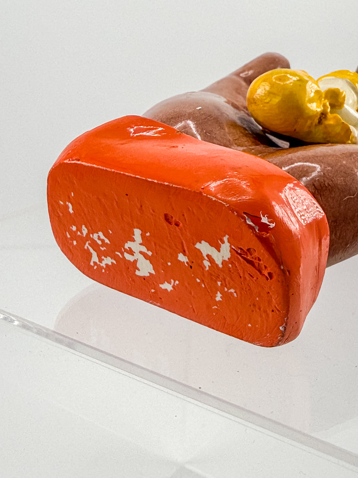Ceramic Hand Sculpture with Sleeping Figure and Orange Cuff - Possibly Religious