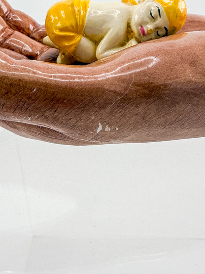 Ceramic Hand Sculpture with Sleeping Figure and Orange Cuff - Possibly Religious