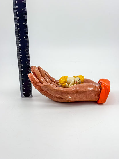 Ceramic Hand Sculpture with Sleeping Figure and Orange Cuff - Possibly Religious