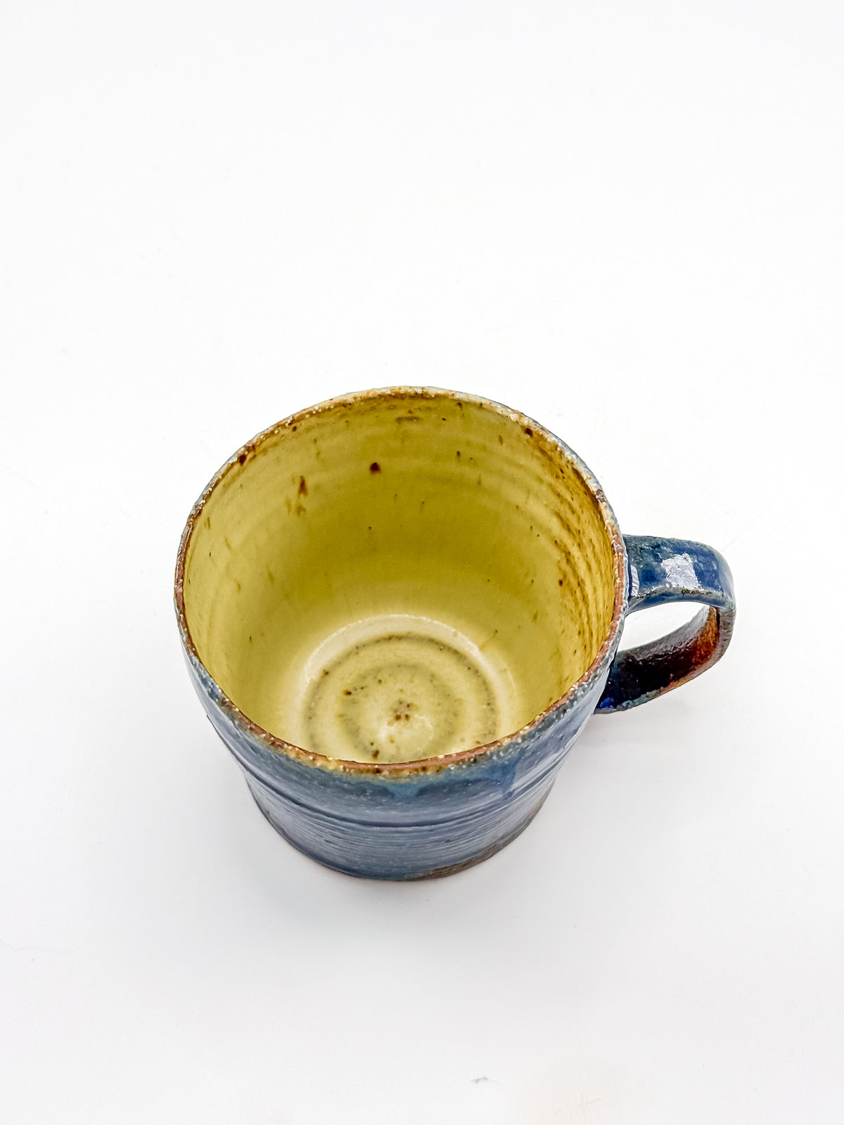 Handmade Blue Studio Pottery Mug with Mustard Yellow Interior