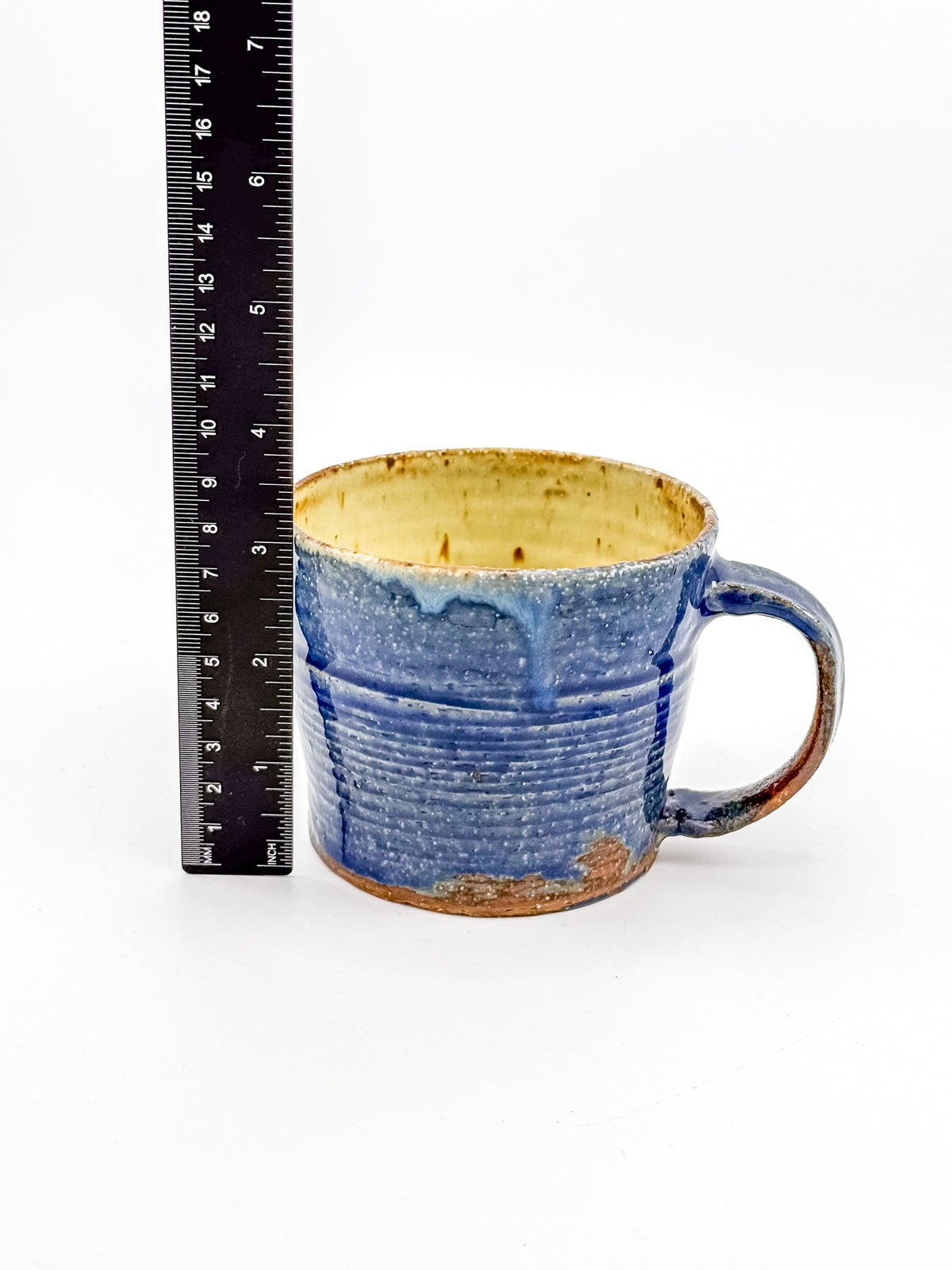 Handmade Blue Studio Pottery Mug with Mustard Yellow Interior