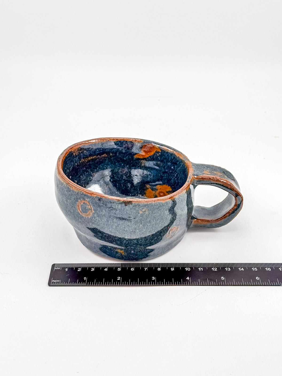 Abstract Blue Studio Pottery Mug with Rust-Orange Glaze Accents