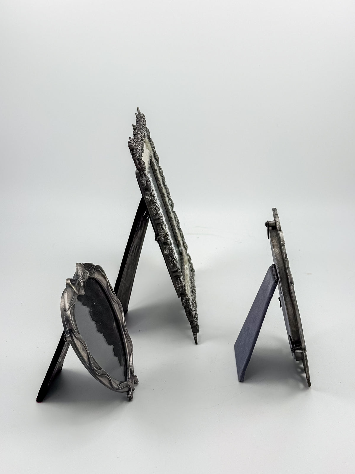 Ornate Pewter and Enamel Picture Frame with Two Silver-Tone Frames, Set of Three