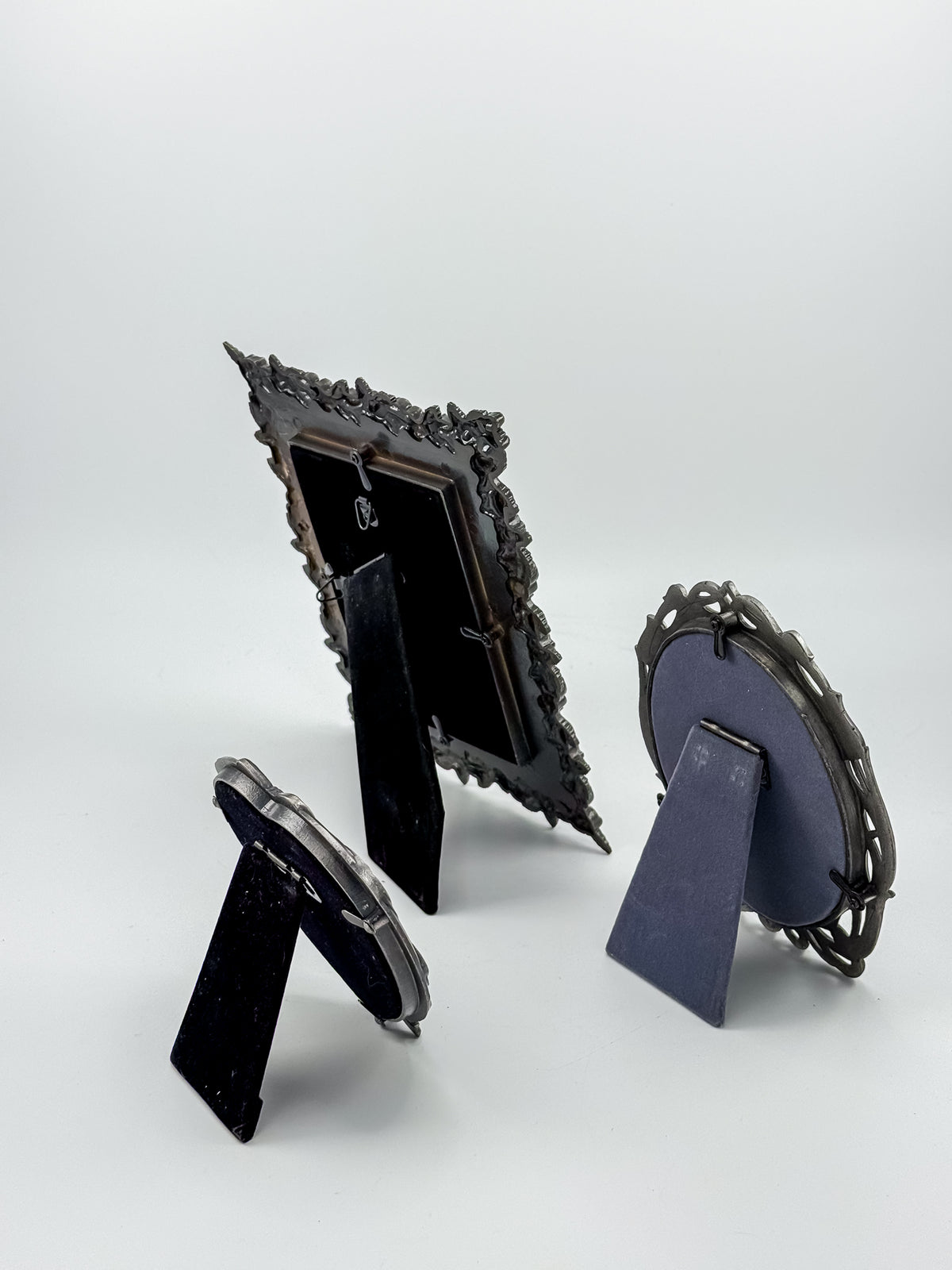 Ornate Pewter and Enamel Picture Frame with Two Silver-Tone Frames, Set of Three