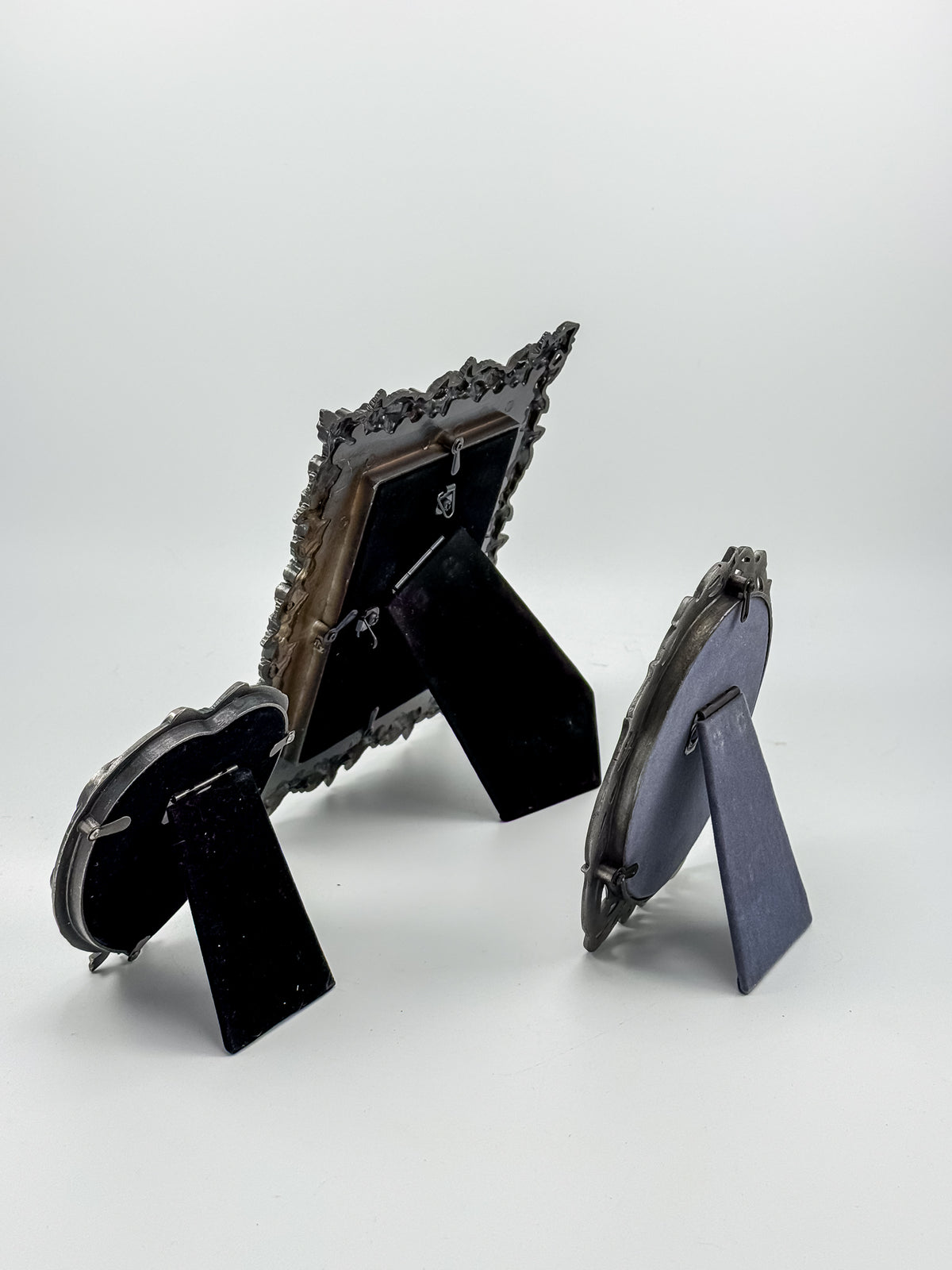 Ornate Pewter and Enamel Picture Frame with Two Silver-Tone Frames, Set of Three