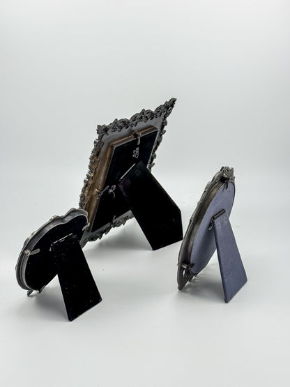 Ornate Pewter and Enamel Picture Frame with Two Silver-Tone Frames, Set of Three