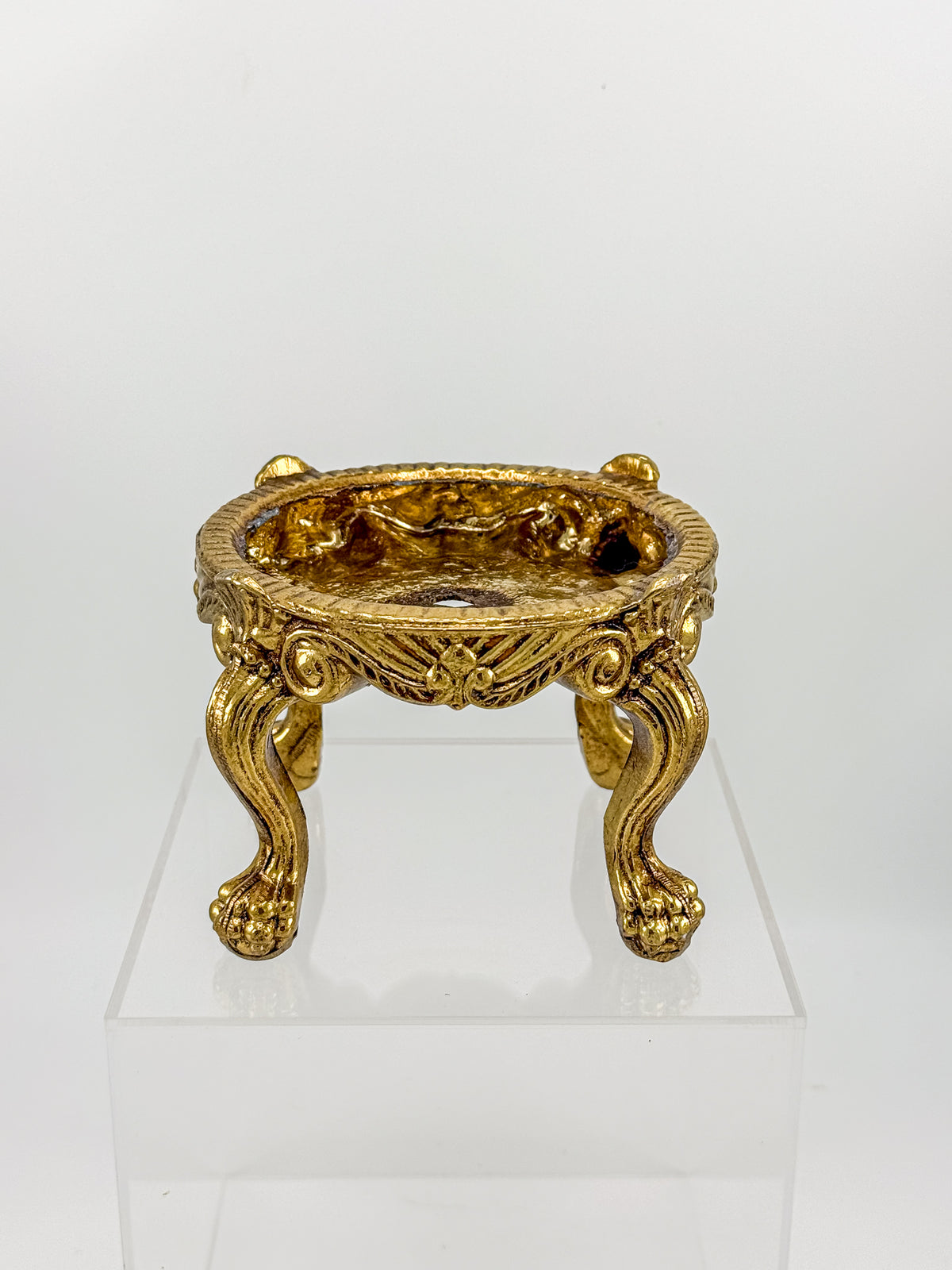 Vintage Ornate Gold-Tone Metal Display Base with Four Claw Feet and Rococo-Style Scrollwork