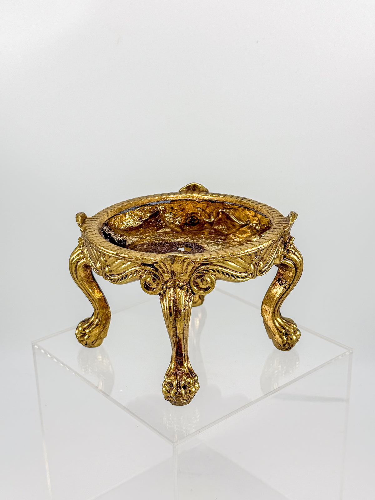Vintage Ornate Gold-Tone Metal Display Base with Four Claw Feet and Rococo-Style Scrollwork