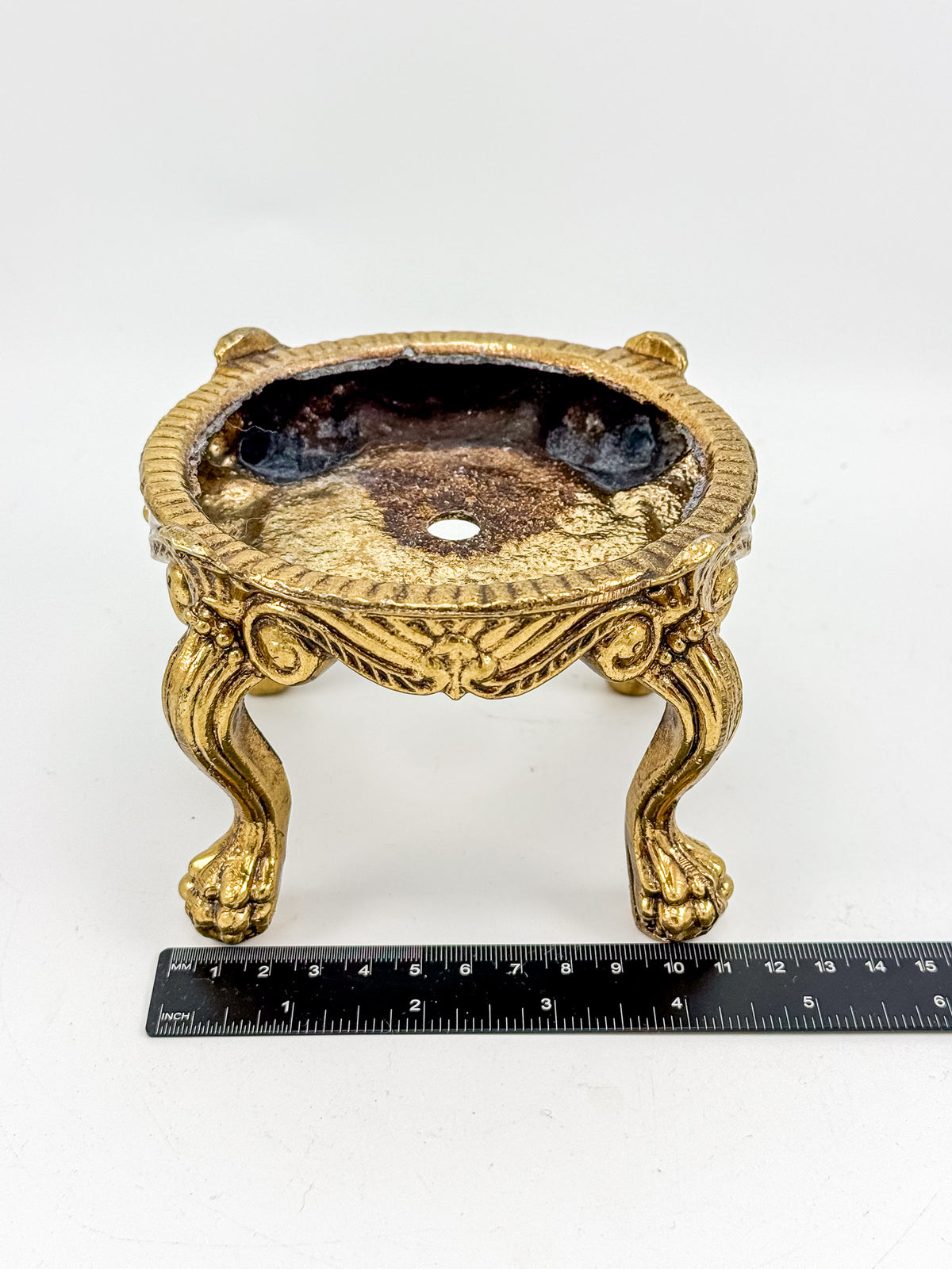 Vintage Ornate Gold-Tone Metal Display Base with Four Claw Feet and Rococo-Style Scrollwork