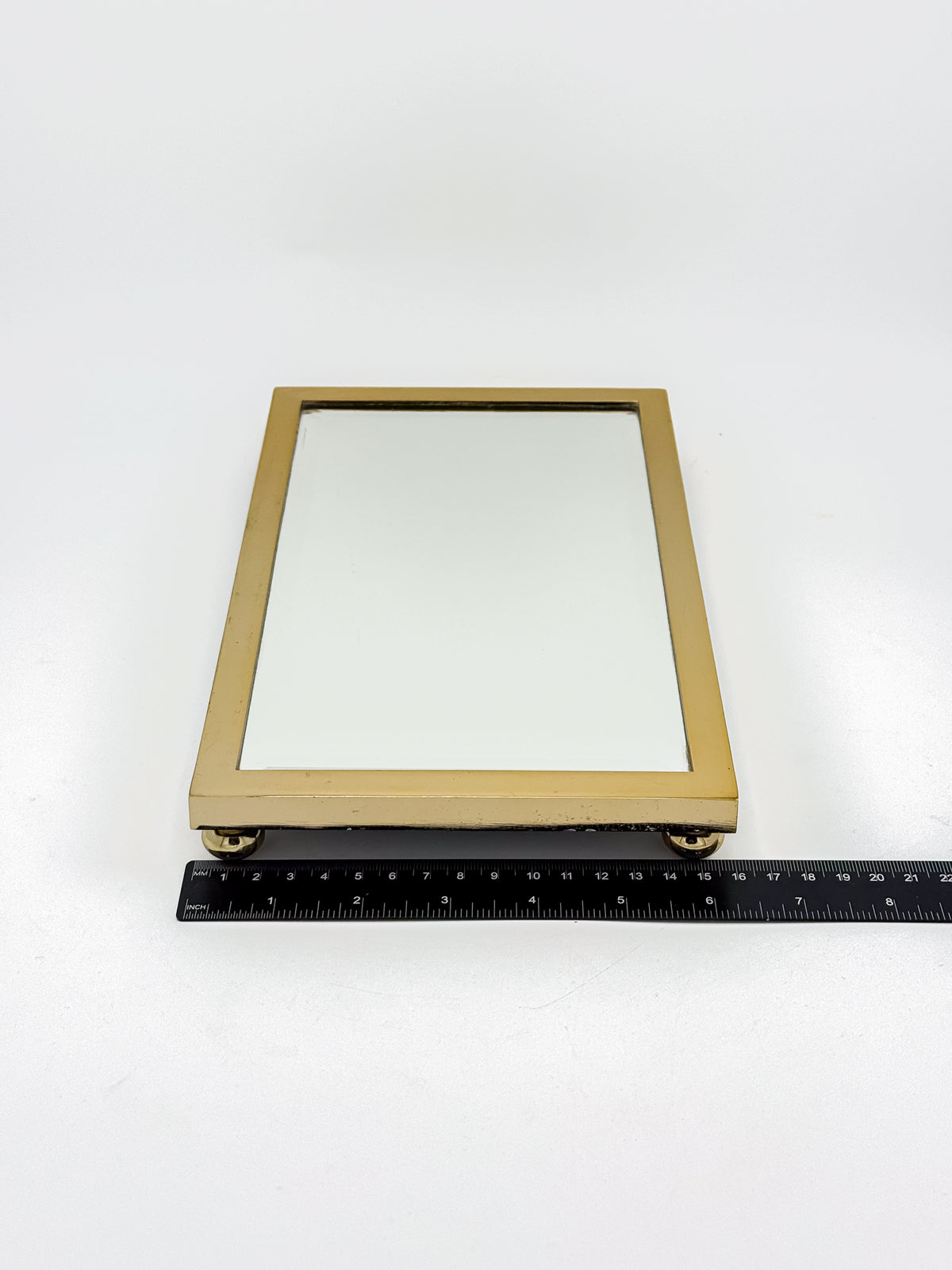 Vintage West Emory Rectangular Brass Mirrored Vanity Tray with Ball Feet