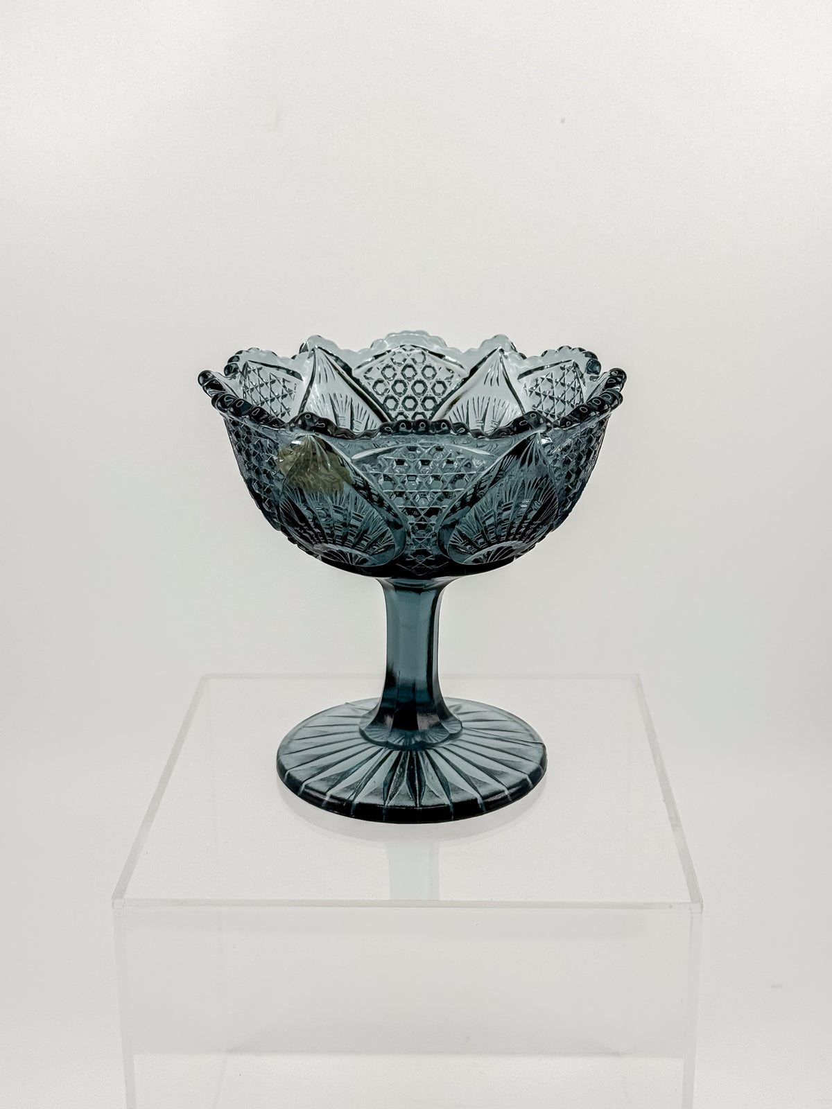 Vintage Fenton Regency Federal Blue Glass Footed Compote with Floral Panels and Scalloped Rim